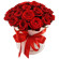 красные розы в шляпной коробке. Мальдивы